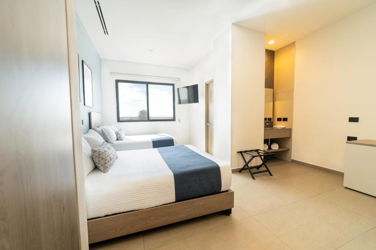 Th Hotel & Vivienda Tepatitlan Extérieur photo